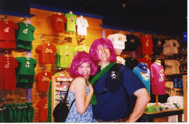 apinkhair couple wearing pink wigs in store