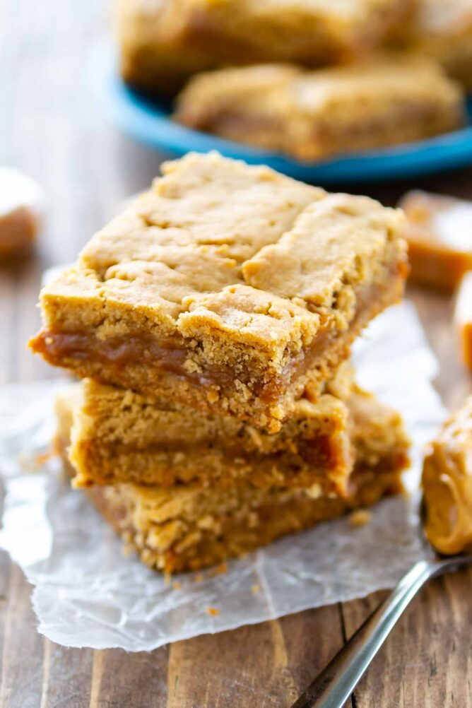 Stack of three caramel peanut butter bars